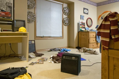 cluttered bedroom in baton rouge louisiana apartment