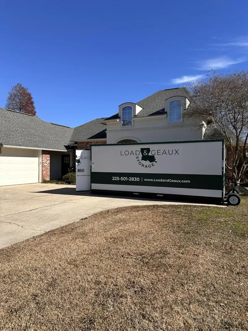 load and geaux storage portable container outside house people moving